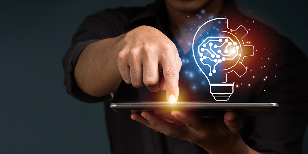 Branding experts presses button on tablet to illustrate ideas.