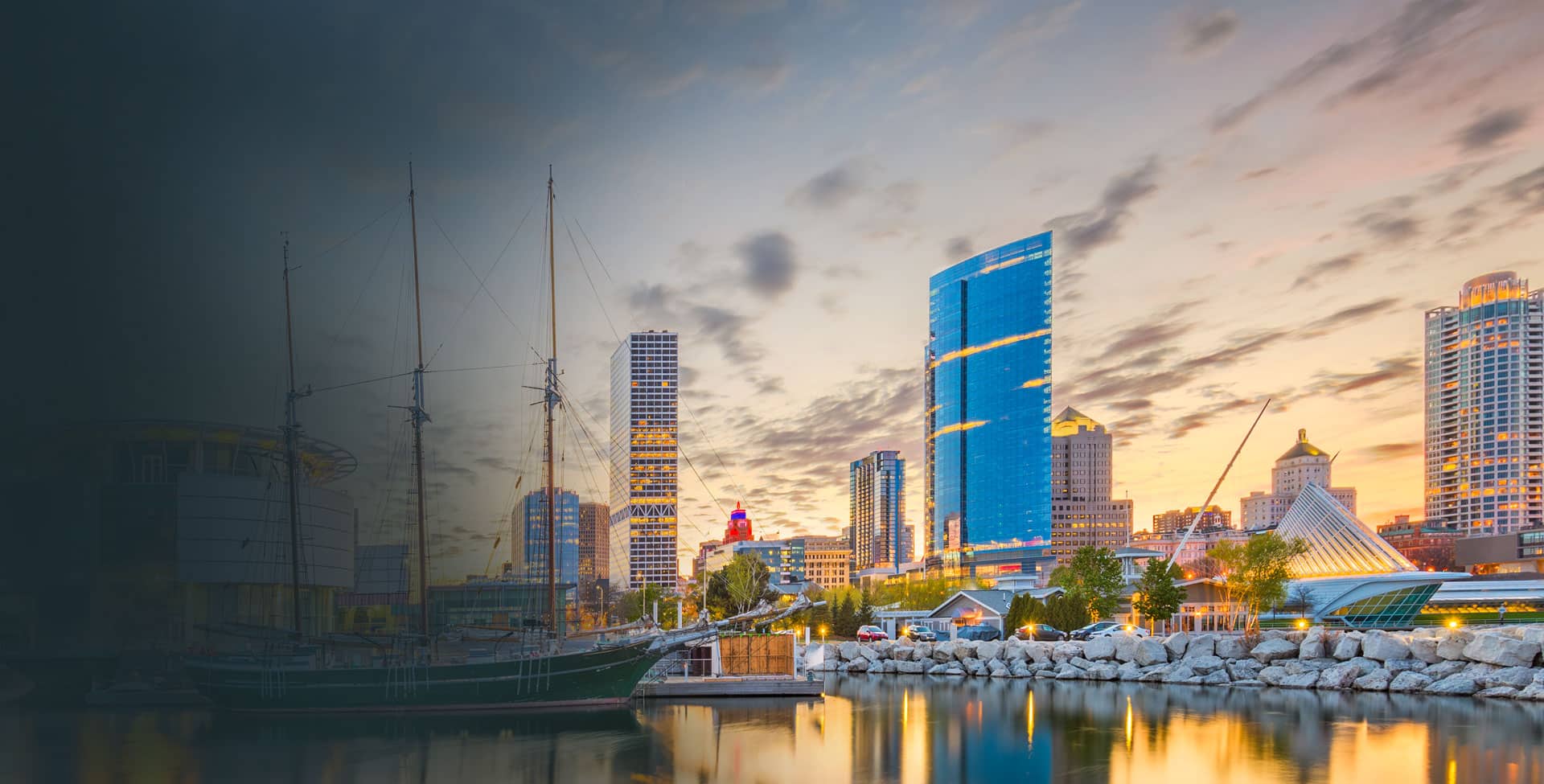Image of Milwaukee’s skyline at dusk, taken from the harbor on Lake Michigan.